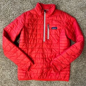 Patagonia 1/4 zip red. One small snag but in new condition!